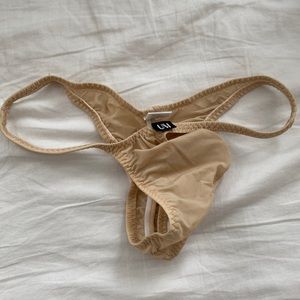 Beige/ sheer under moon cheek thong